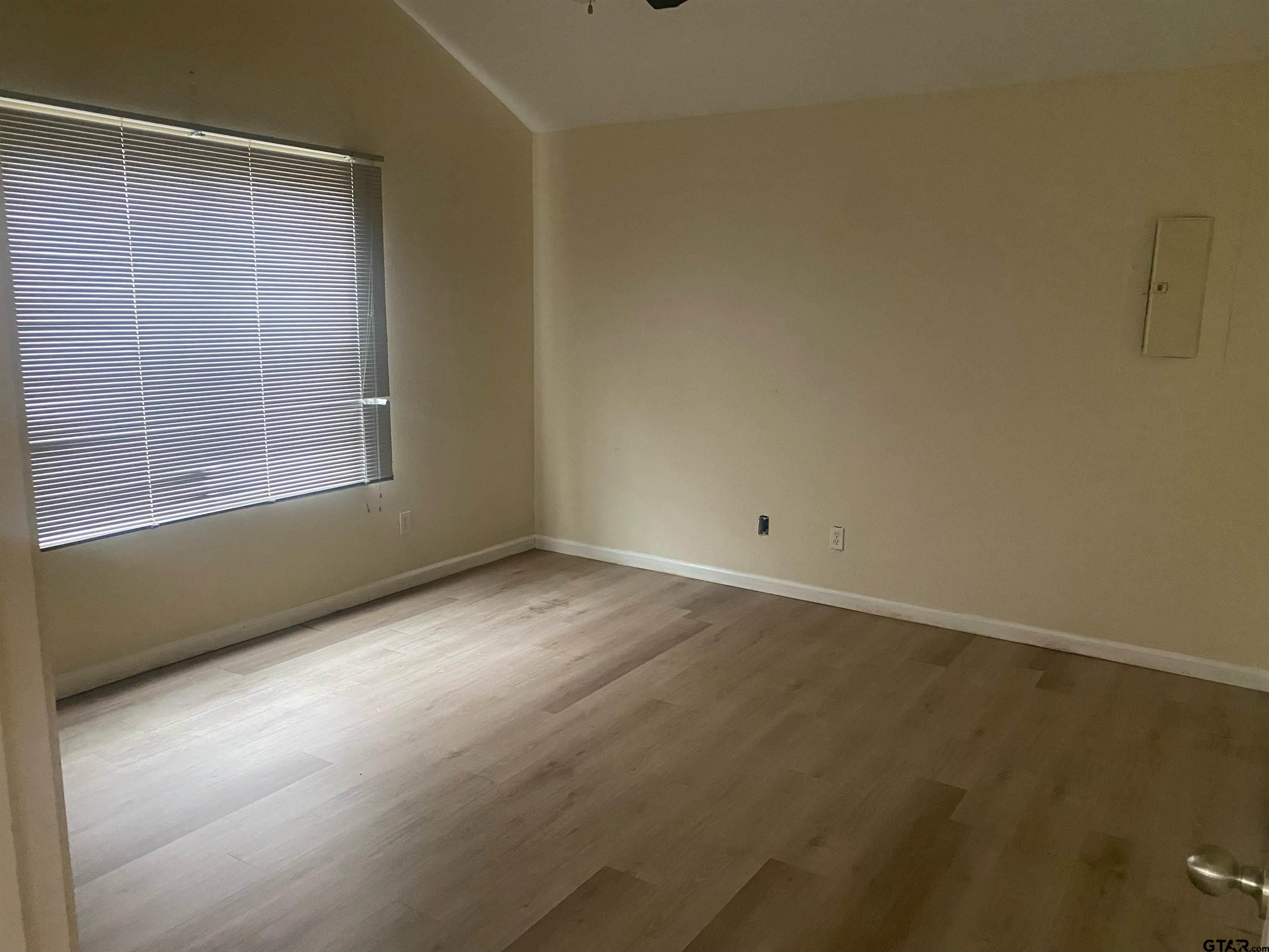 717 West Morris Street Tyler, TX 75702 - Photo 10 of 18 an empty room with a window