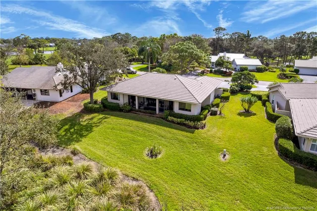 a view of a house with a swimming pool