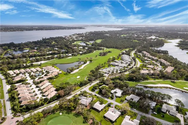 a view of a city with an ocean