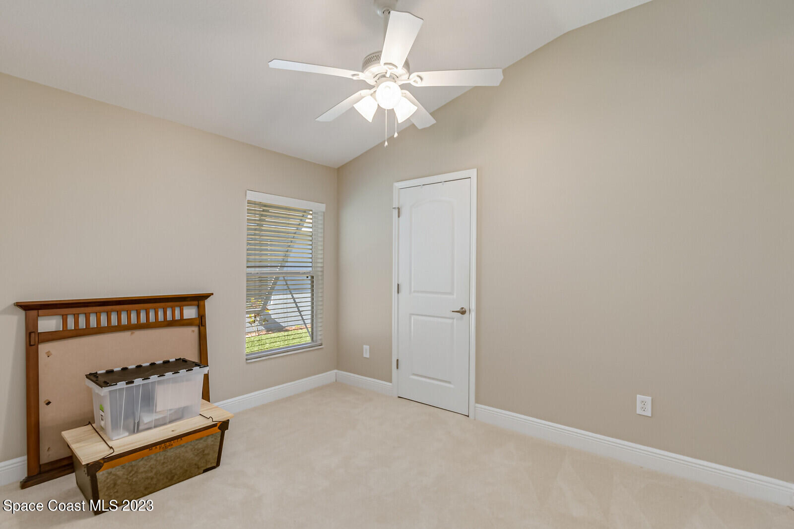 1569 Oconner Avenue Melbourne, FL 32940 - Photo 20 of 37 a living room with furniture and a table