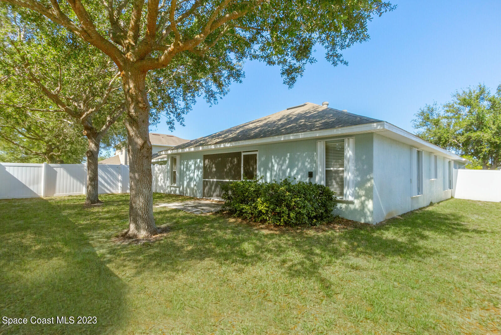1569 Oconner Avenue Melbourne, FL 32940 - Photo 25 of 37 a view of a house with a yard