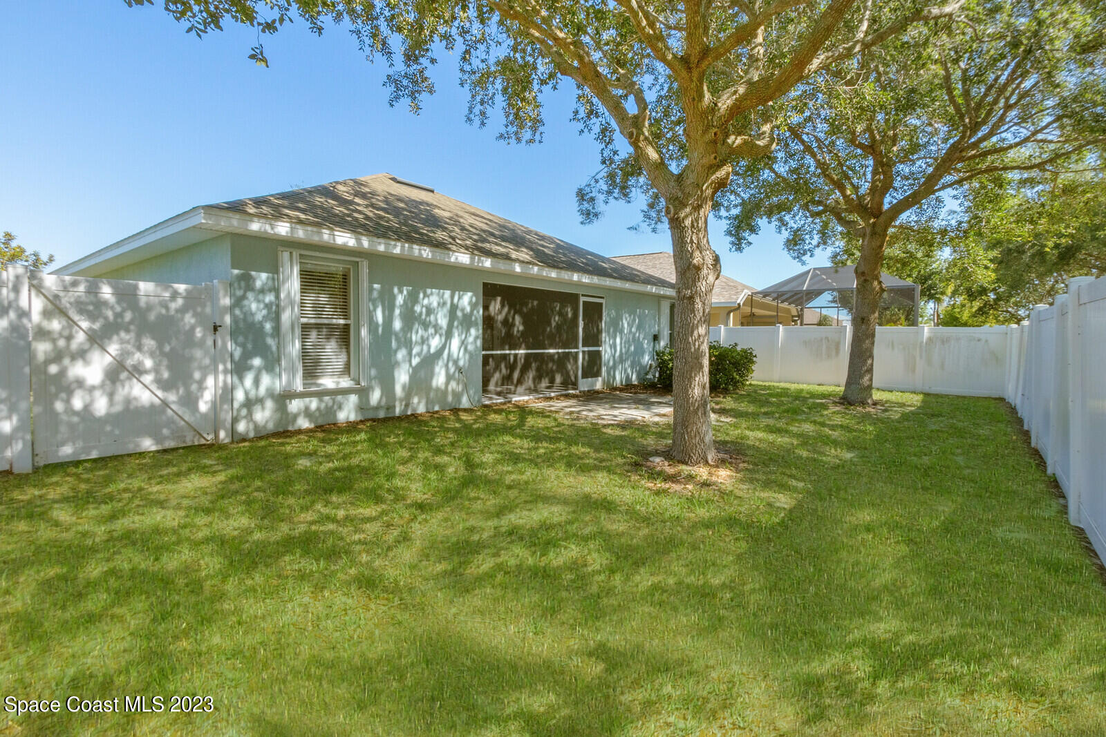 1569 Oconner Avenue Melbourne, FL 32940 - Photo 27 of 37 a front view of a house with garden