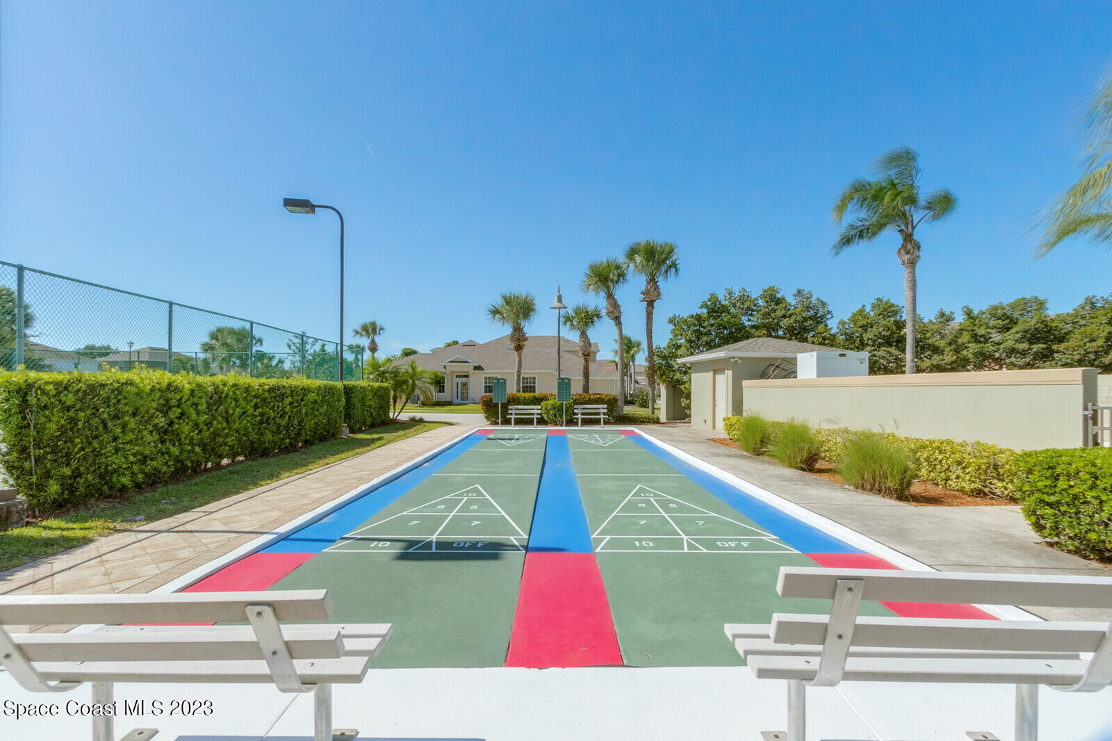 1569 Oconner Avenue Melbourne, FL 32940 - Photo 33 of 37 a view of a swimming pool with a yard and potted plants