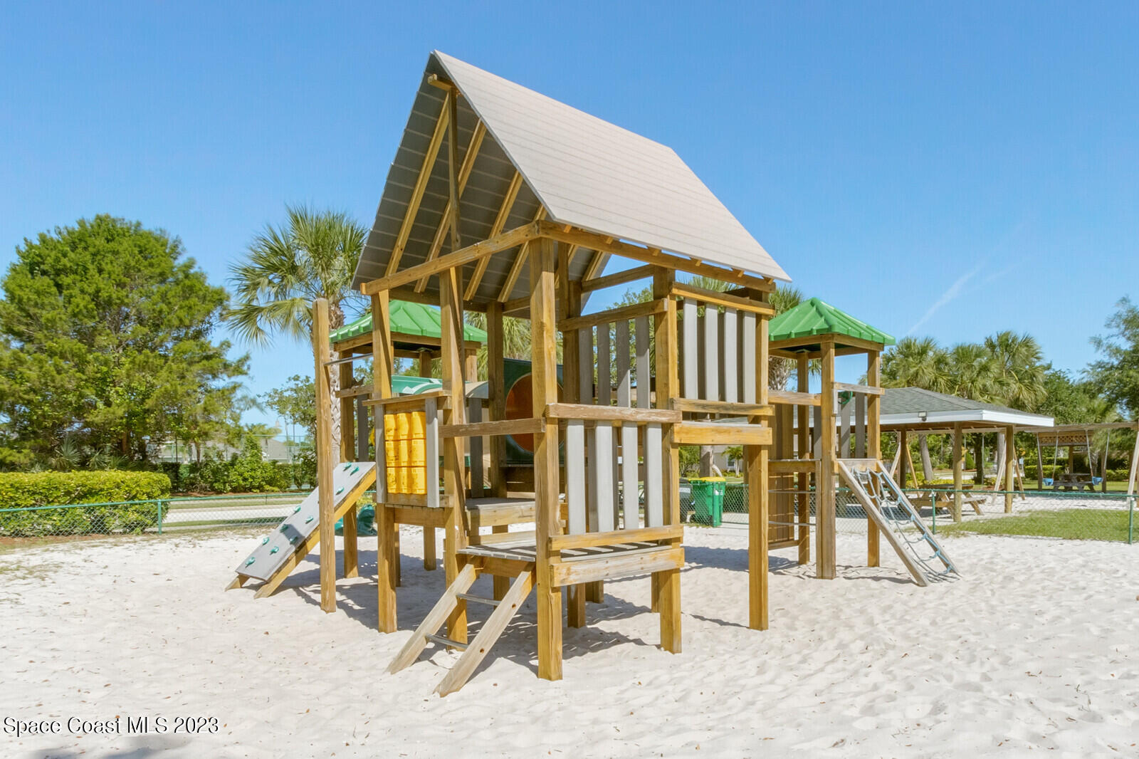 1569 Oconner Avenue Melbourne, FL 32940 - Photo 34 of 37 a view of house with a swimming pool and sitting area