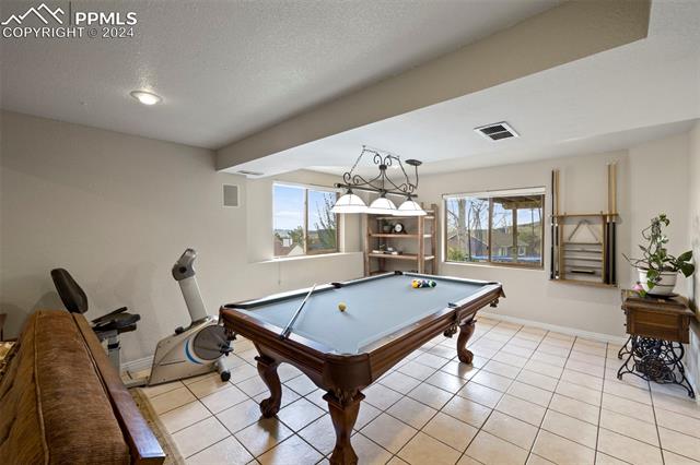 7850 Julynn Road Colorado Springs, CO 80919 - Photo 23 of 40 Spacious basement for entertaining and more