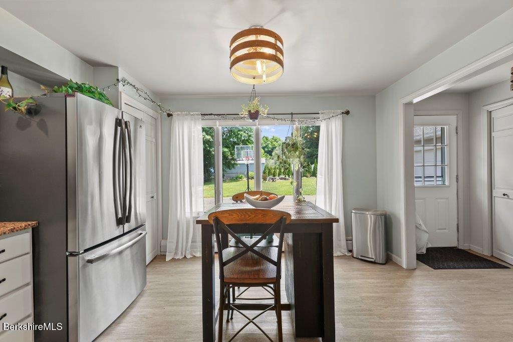 33 Eleanor Road Pittsfield, MA 01201 - Photo 17 of 45 a dining room with furniture and window