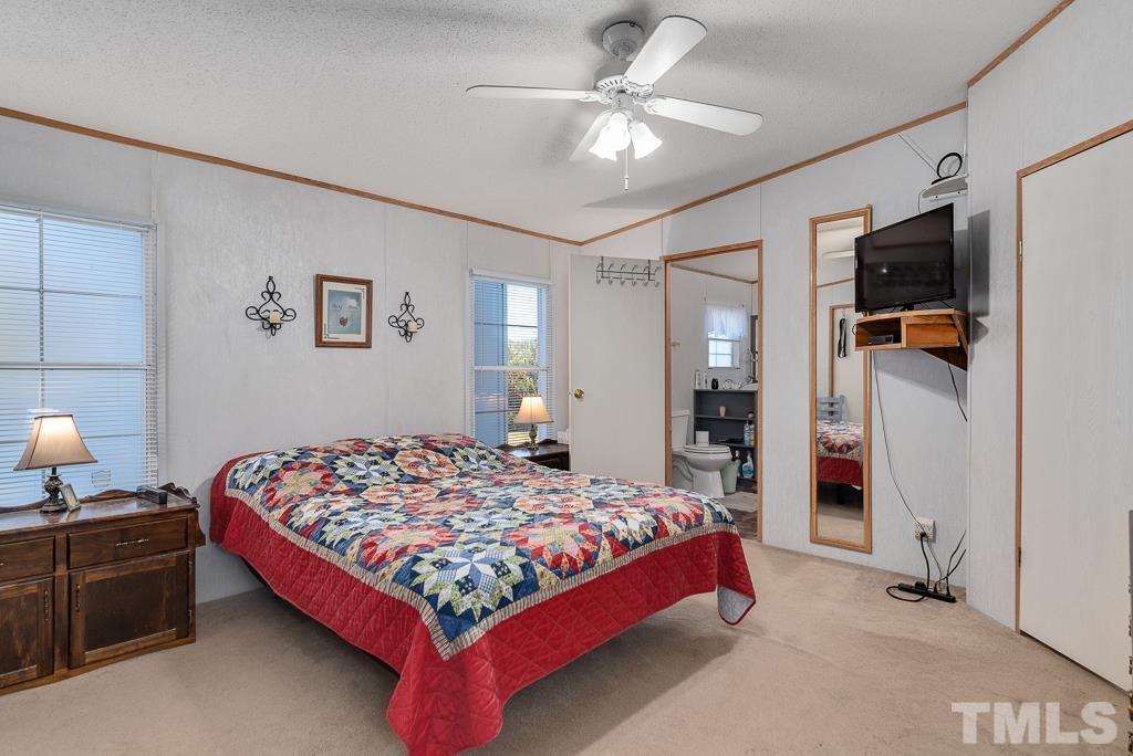 128 Double D Farm Road Angier, NC 27501 - Photo 24 of 29 Primary bedroom