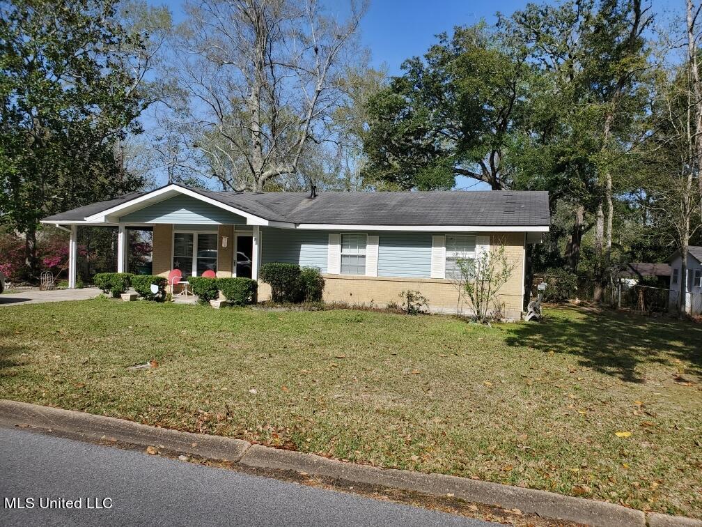2801 Dantzler Street Moss Point, MS 39563 - Photo 3 of 23 Front view with carport and covered fron