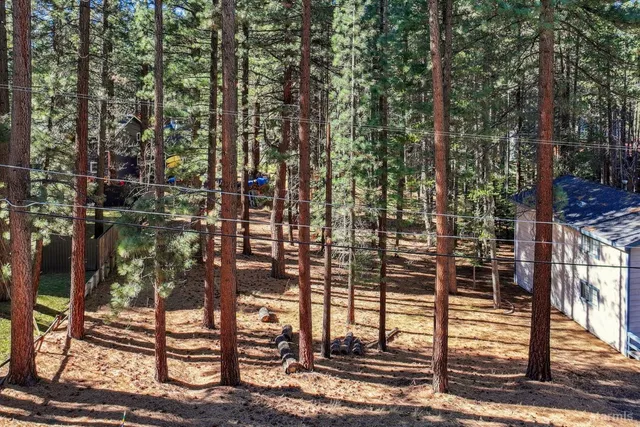 a view of a city from a corridor