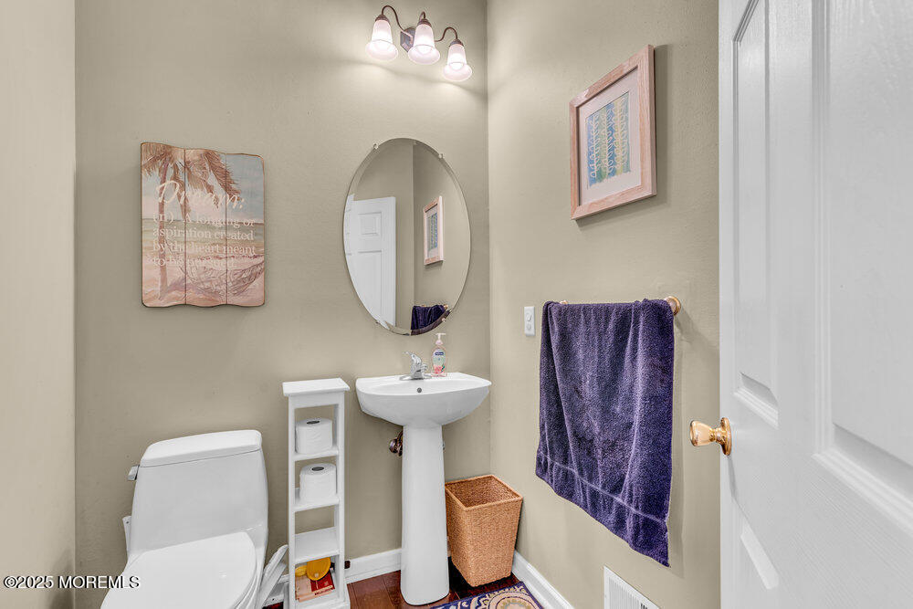 41 Hampshire Boulevard Jackson, NJ 08527 - Photo 18 of 55 a bathroom with a toilet sink and mirror