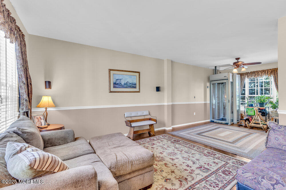 41 Hampshire Boulevard Jackson, NJ 08527 - Photo 2 of 55 a living room with furniture and a lamp