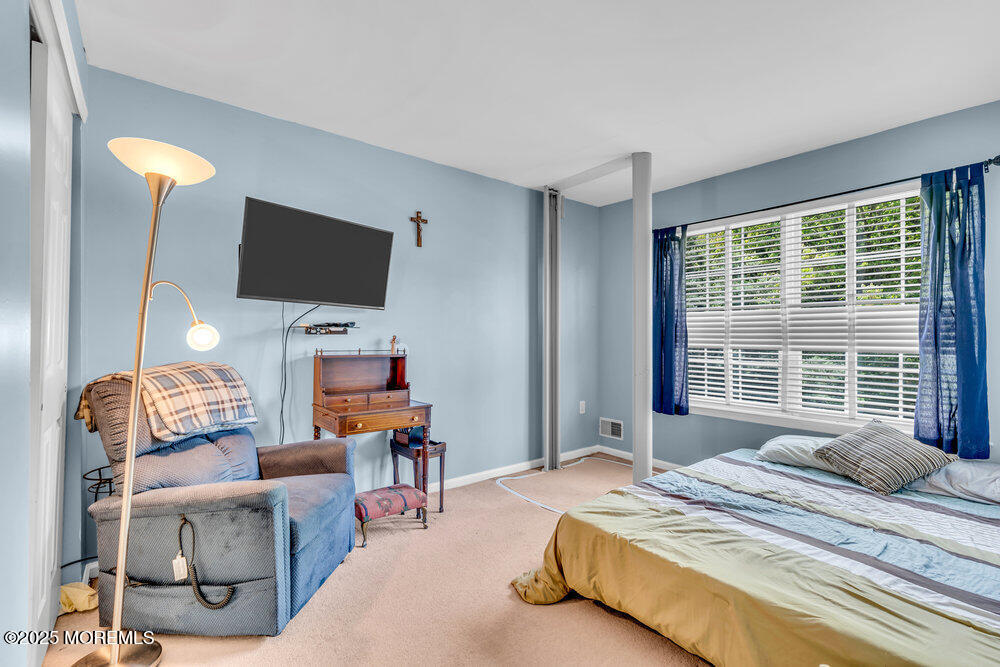 41 Hampshire Boulevard Jackson, NJ 08527 - Photo 22 of 55 a bedroom with bed tv and window