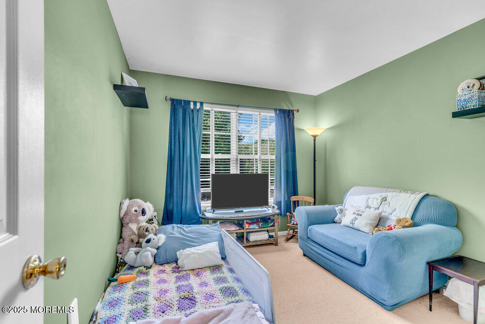 41 Hampshire Boulevard Jackson, NJ 08527 - Photo 24 of 55 a living room with furniture and a window
