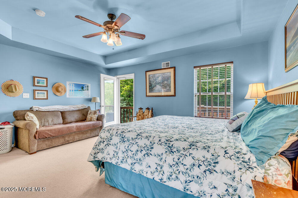 41 Hampshire Boulevard Jackson, NJ 08527 - Photo 26 of 55 a living room with a bed furniture and a window