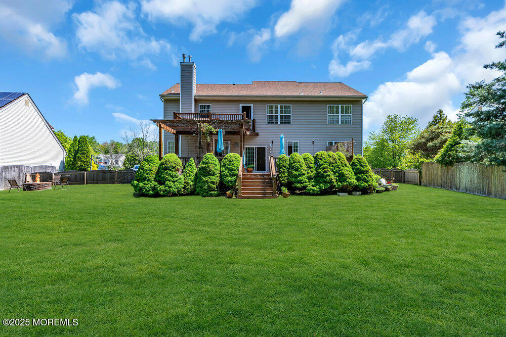 41 Hampshire Boulevard Jackson, NJ 08527 - Photo 39 of 55 a view of a house with a big yard plants and large trees