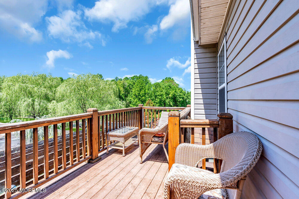 41 Hampshire Boulevard Jackson, NJ 08527 - Photo 4 of 55 a view of a chairs on the roof deck