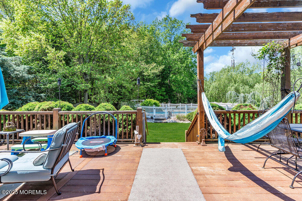 41 Hampshire Boulevard Jackson, NJ 08527 - Photo 41 of 55 a view of deck with furniture and garden