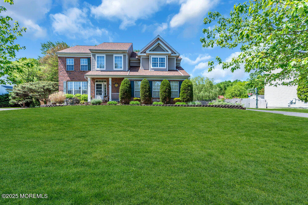 41 Hampshire Boulevard Jackson, NJ 08527 - Photo 50 of 55 a front view of a house with a garden