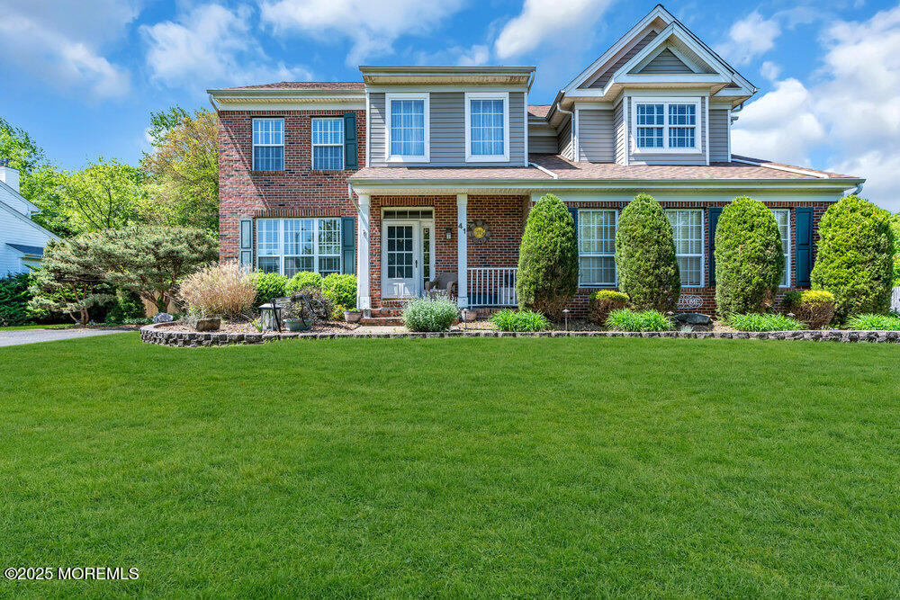 41 Hampshire Boulevard Jackson, NJ 08527 - Photo 54 of 55 a front view of a house with garden and porch