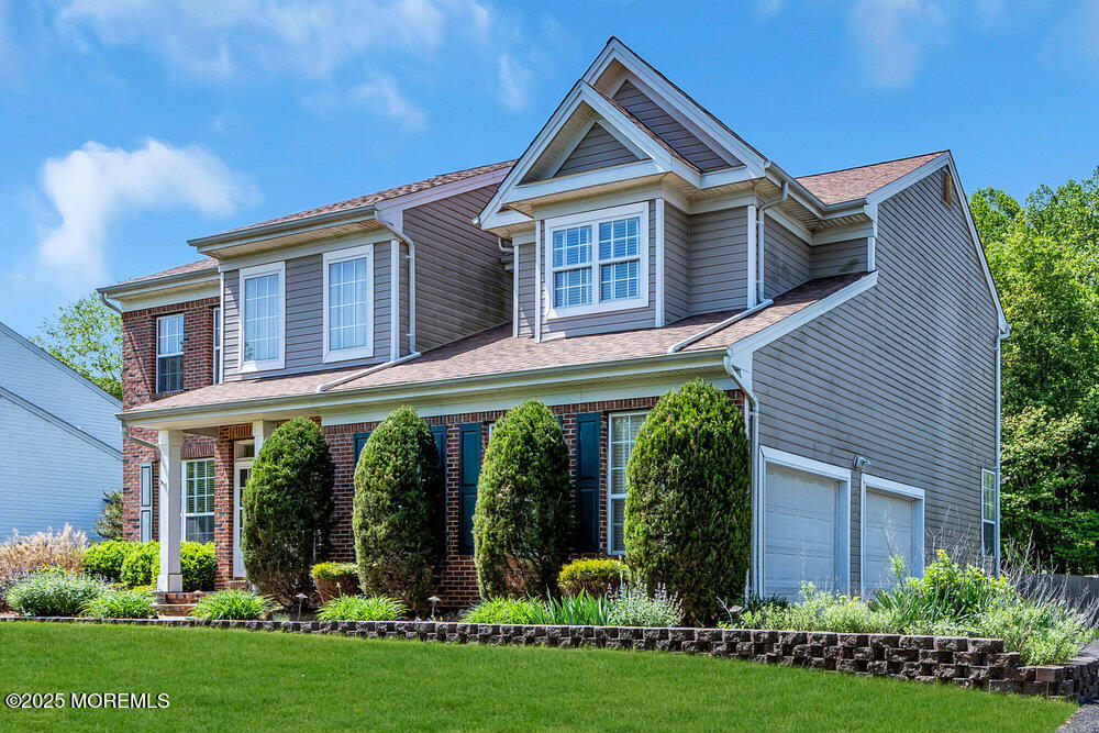 41 Hampshire Boulevard Jackson, NJ 08527 - Photo 6 of 55 a front view of a house with garden