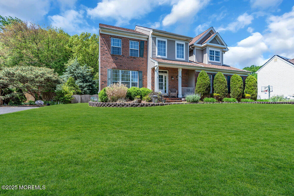 41 Hampshire Boulevard Jackson, NJ 08527 - Photo 7 of 55 a front view of house with yard and green space