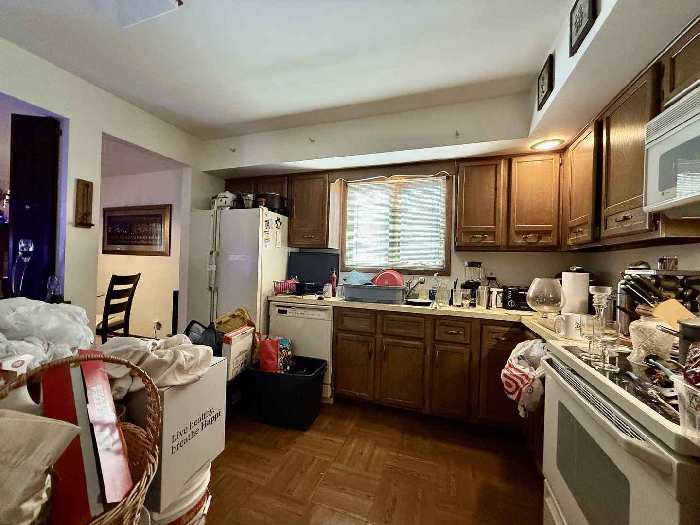 1545 Winnetka Road, Unit 1545 Glenview, IL 60025 - Photo 4 of 14 a kitchen that has a sink cabinets counter space and a window
