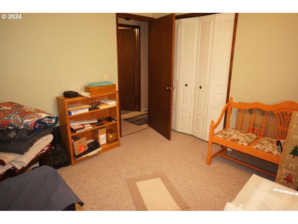 5637 E Street Springfield, OR 97478 - Photo 12 of 27 a bedroom with a bed and a dresser