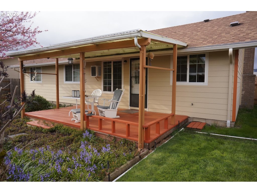5637 E Street Springfield, OR 97478 - Photo 18 of 27 a view of a house with a yard and sitting area