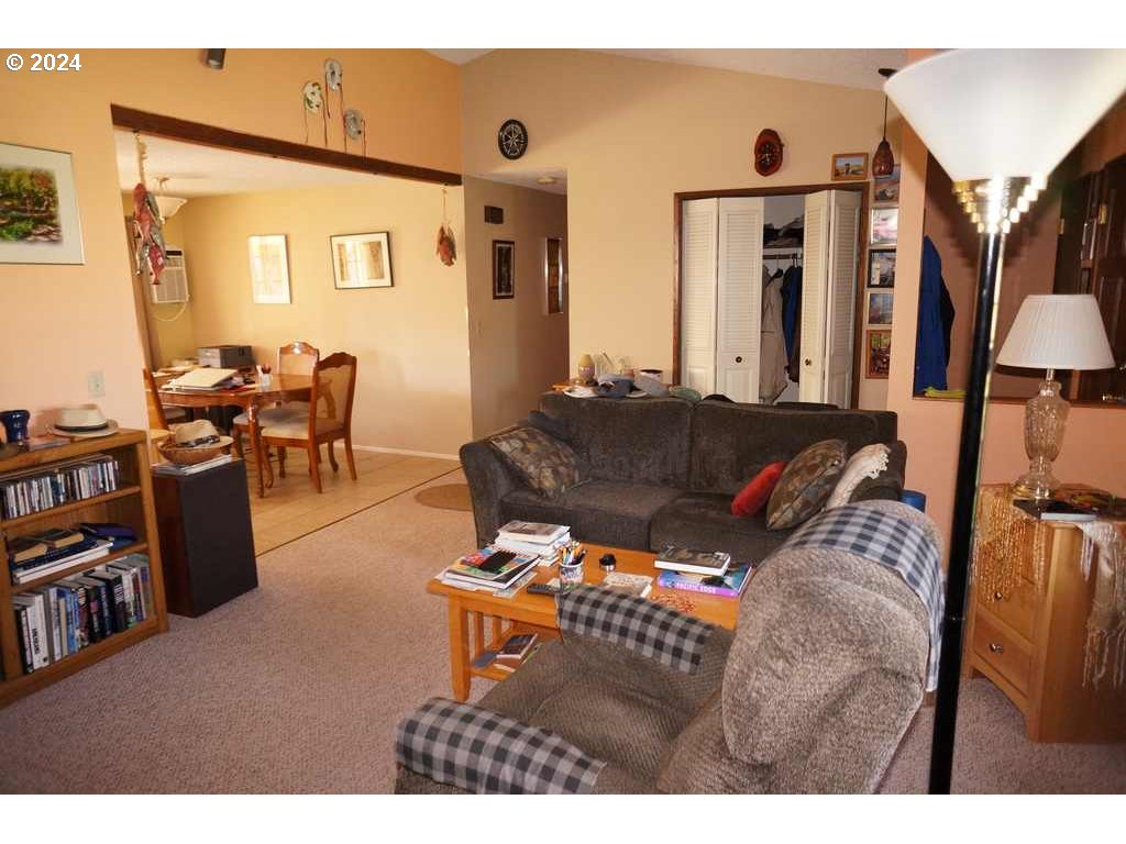 5637 E Street Springfield, OR 97478 - Photo 6 of 27 a living room with furniture and a flat screen tv