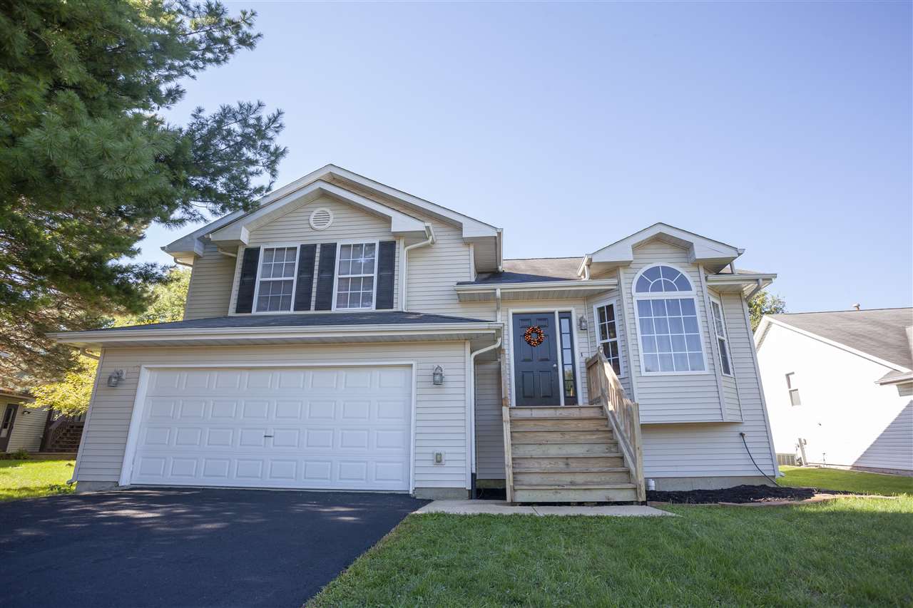 519 Pembroke Road Southwest Poplar Grove, IL 61065 - Photo 1 of 25 front view of house with a yard