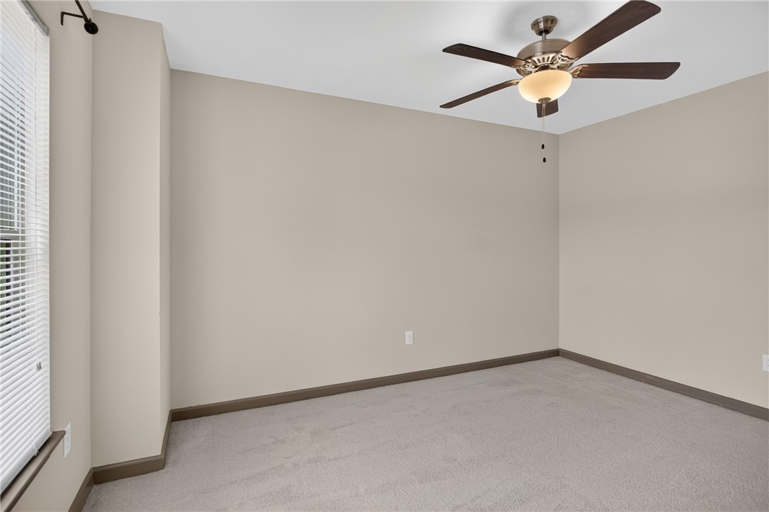 235 Pendleton Road, Unit K1 Clemson, SC 29631 - Photo 35 of 49 An inviting room features a functional ceiling fan, enhancing comfort and air circulation.