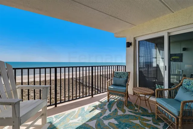 a view of a porch with furniture