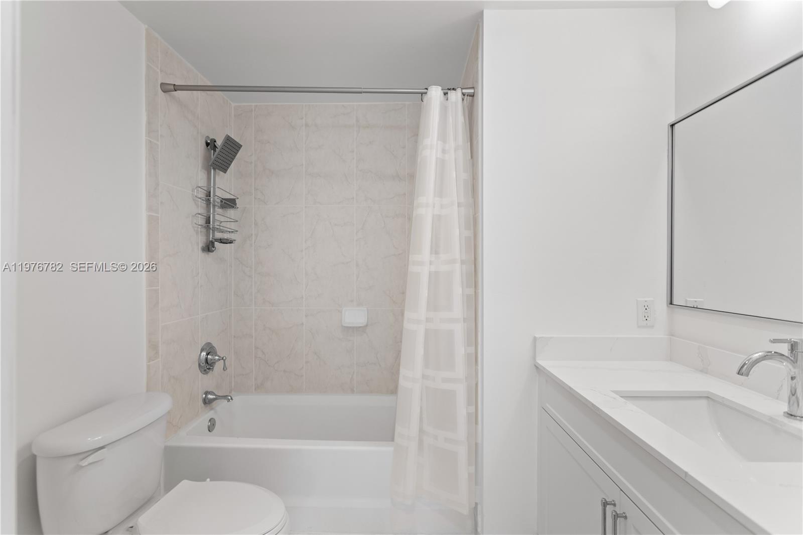 6851 Southwest 44th Street, Unit 107 Miami, FL 33155 - Photo 28 of 41 a bathroom with a sink toilet and shower