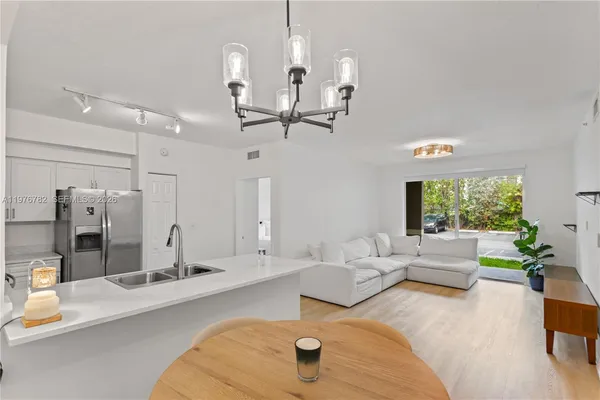 a view of storage and utility room with washer and dryer