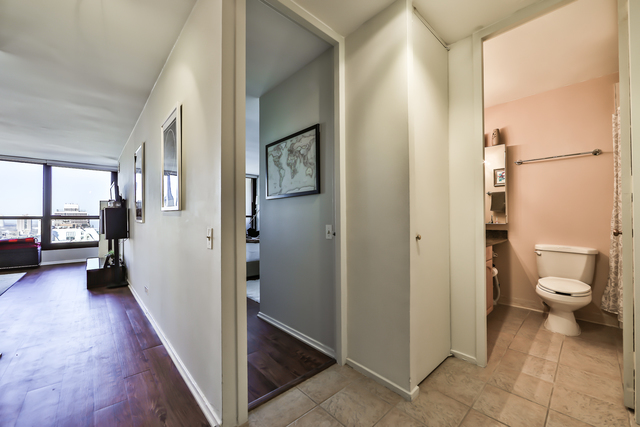 1030 North State Street, Unit 20D Chicago, IL 60610 - Photo 16 of 22 a view of a bathroom from a hallway