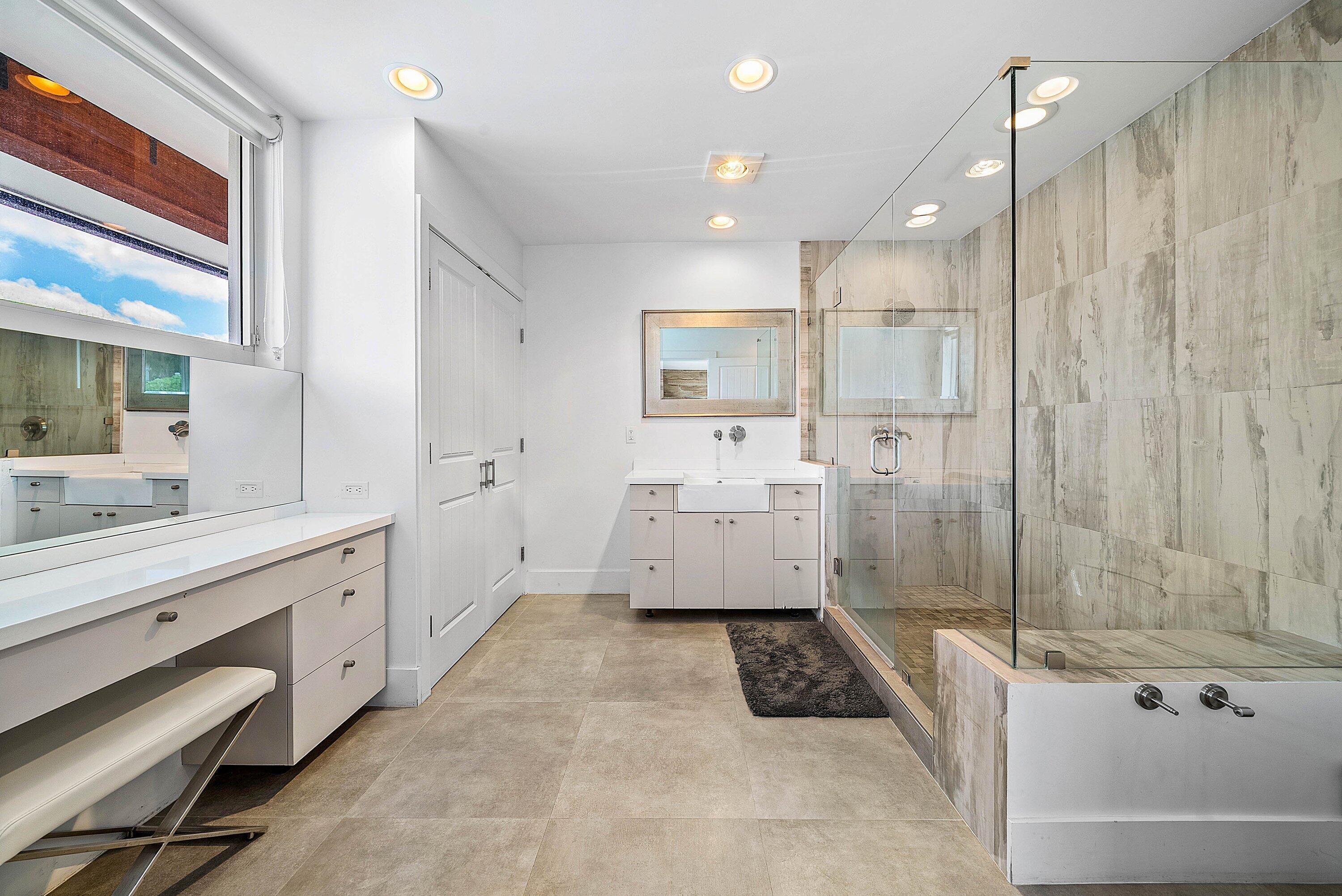 740 Northeast 36th Street Boca Raton, FL 33431 - Photo 15 of 43 a bathroom with a tub a sink and a shower