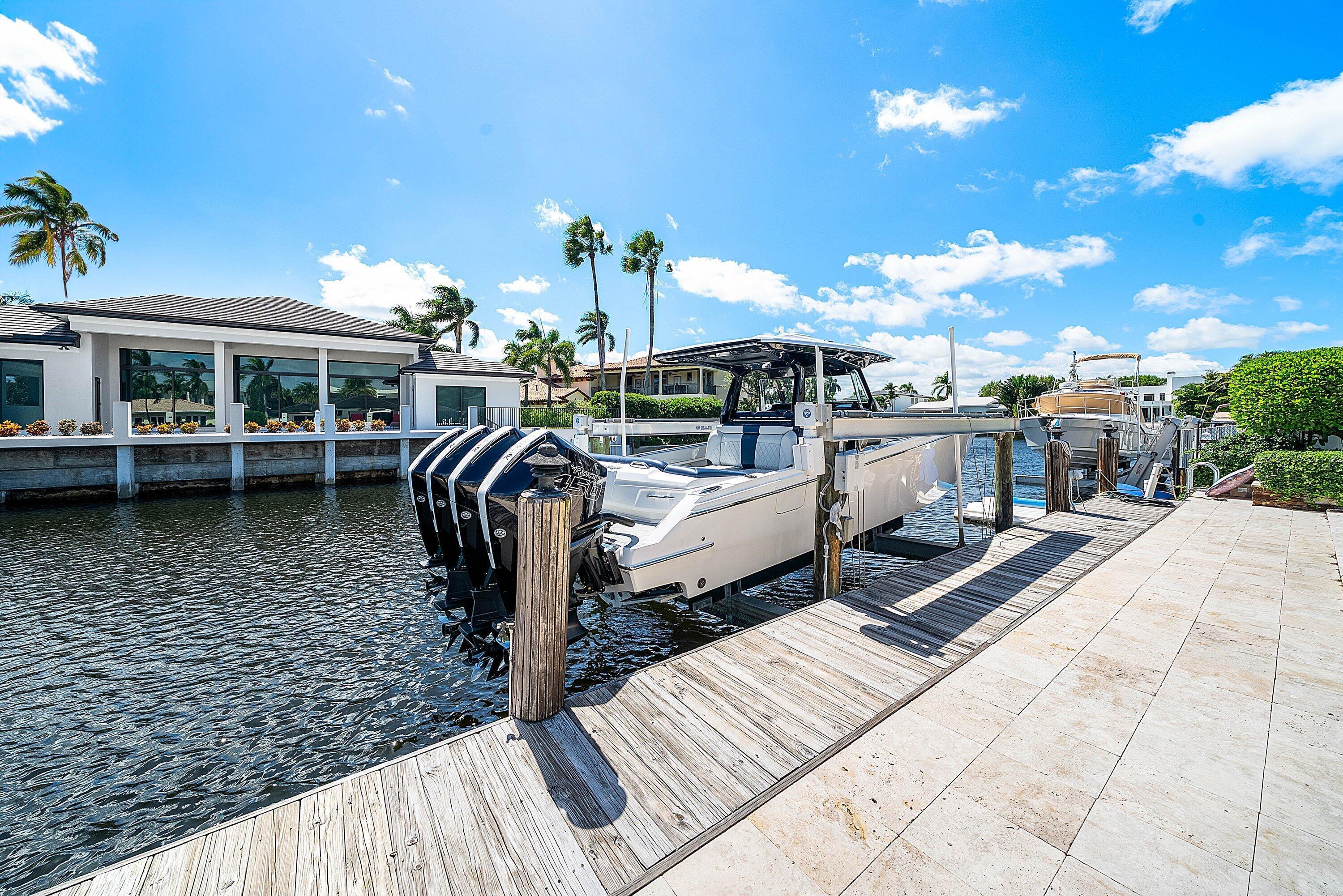 740 Northeast 36th Street Boca Raton, FL 33431 - Photo 24 of 43 a view of a patio with couches chairs and a table