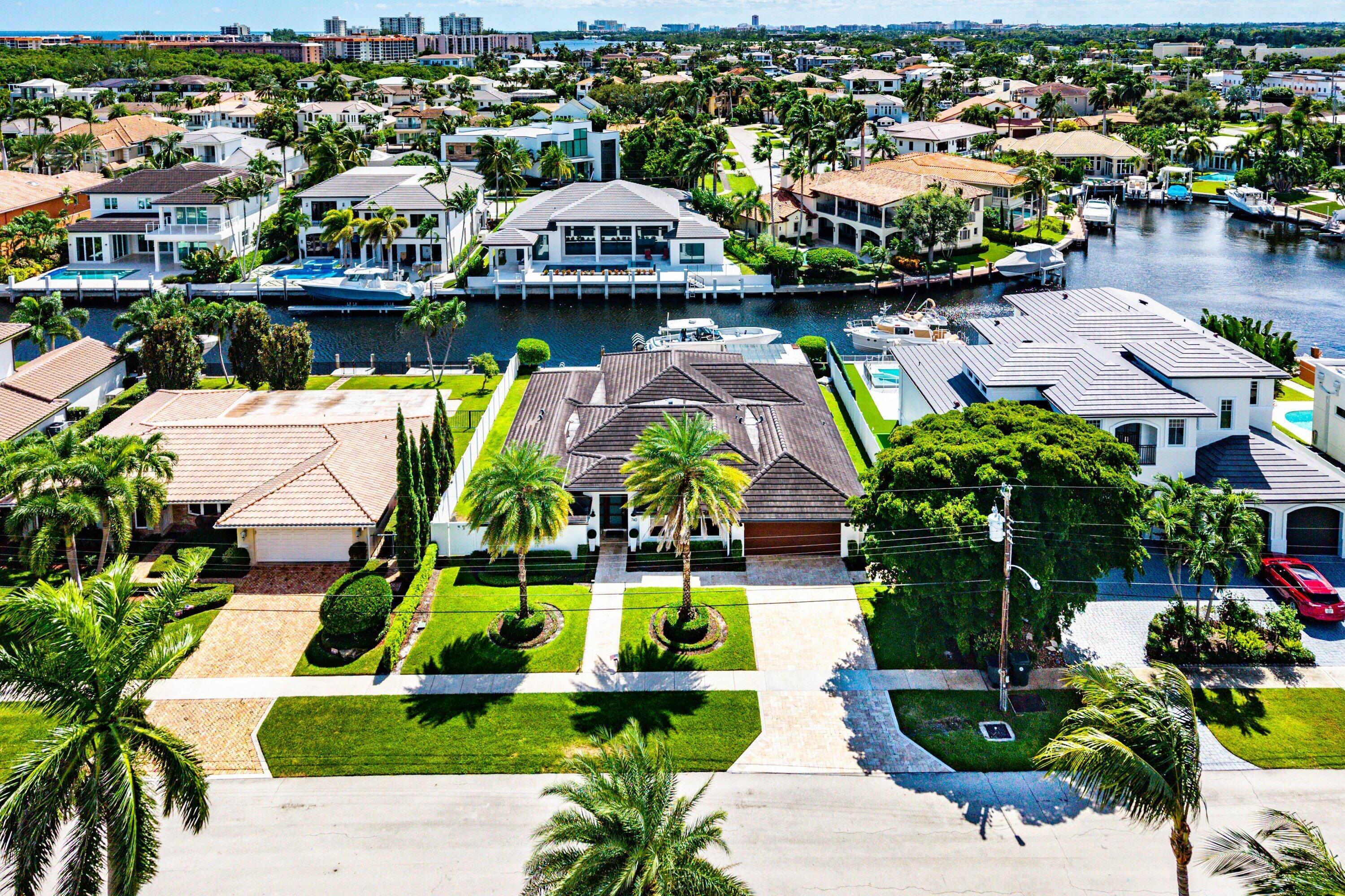 740 Northeast 36th Street Boca Raton, FL 33431 - Photo 34 of 43 an aerial view of house with yard swimming pool and outdoor seating