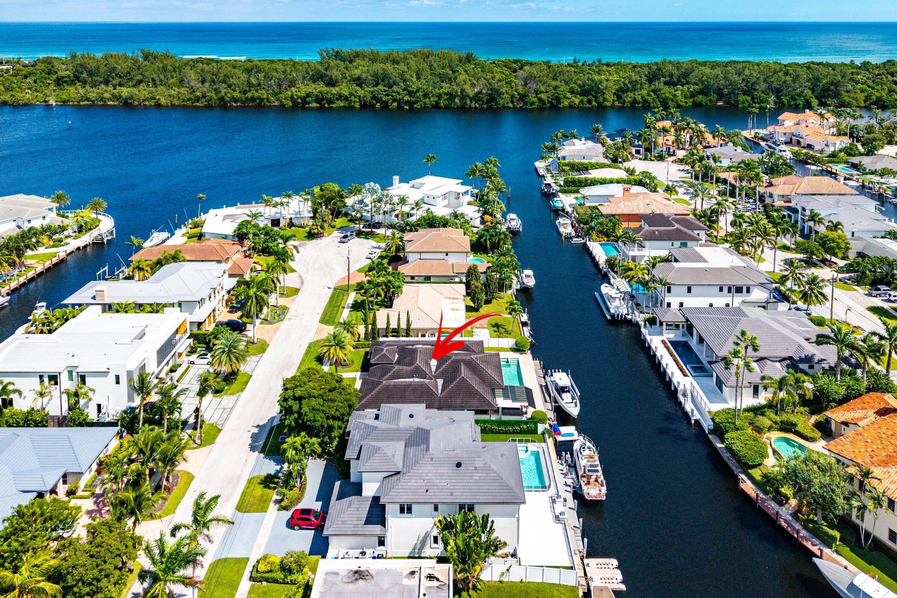 740 Northeast 36th Street Boca Raton, FL 33431 - Photo 35 of 43 an aerial view of a house with a lake view
