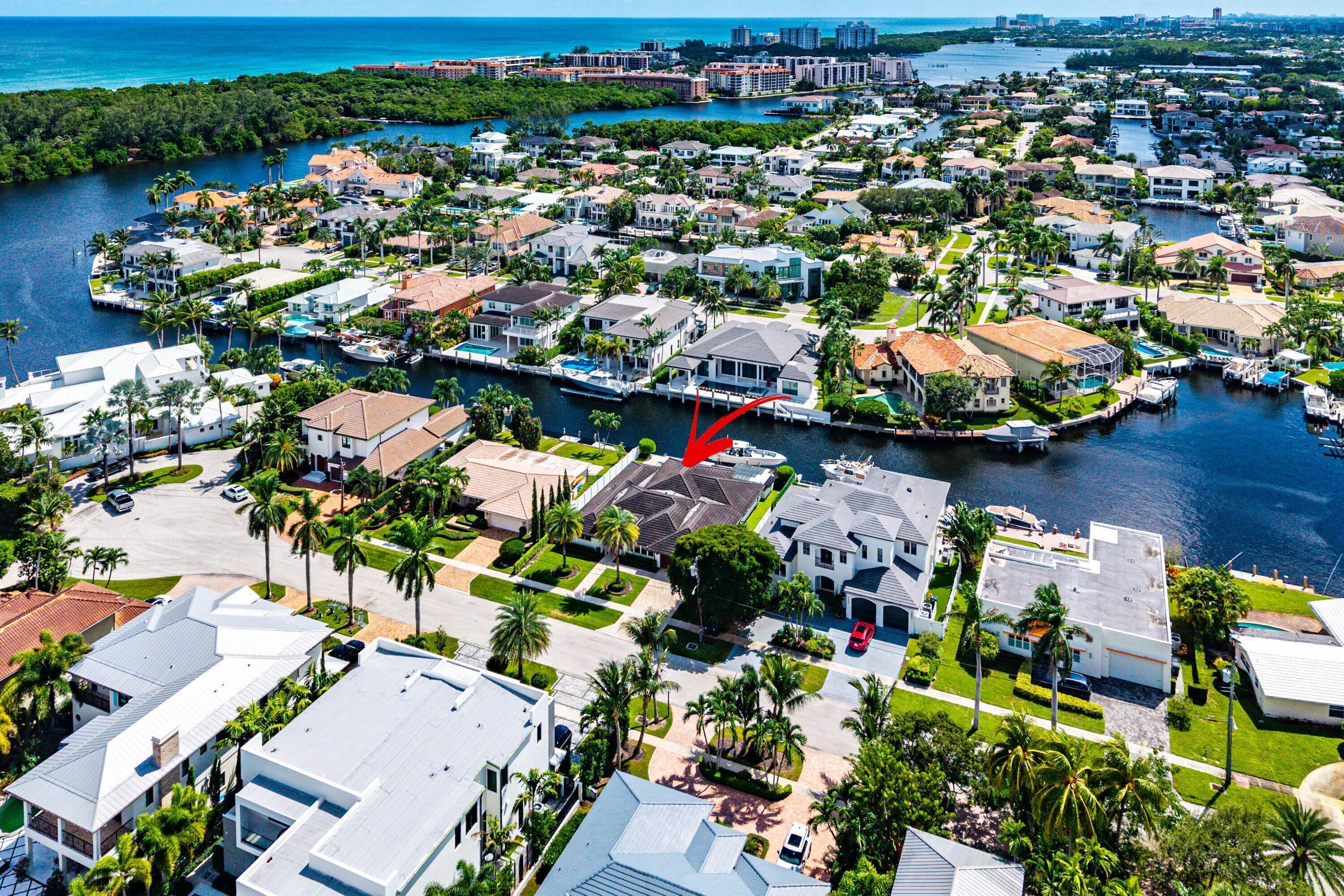 740 Northeast 36th Street Boca Raton, FL 33431 - Photo 36 of 43 an aerial view of a houses and city street