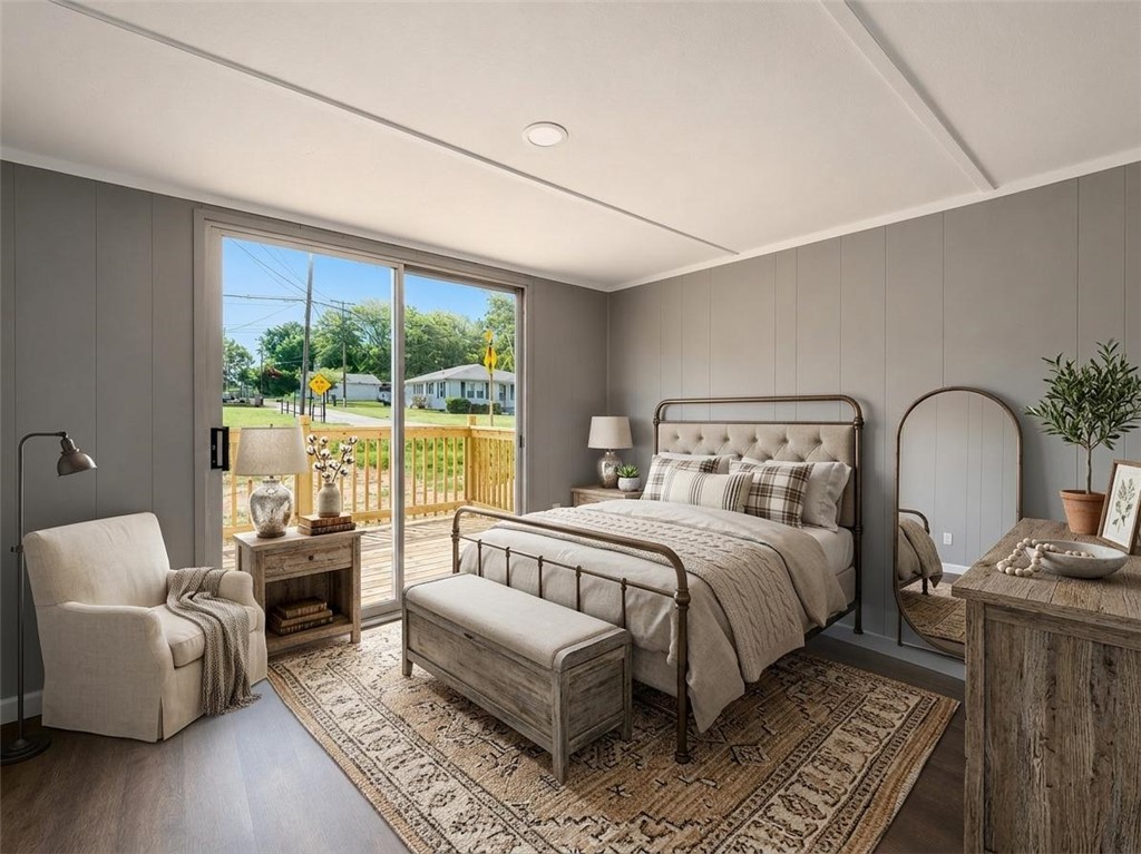3301 Dixon Road Anderson, SC 29625 - Photo 3 of 20 Step into a comfortable bedroom featuring a private deck, ideal for quiet mornings. *AI VIRTUALLY STAGED