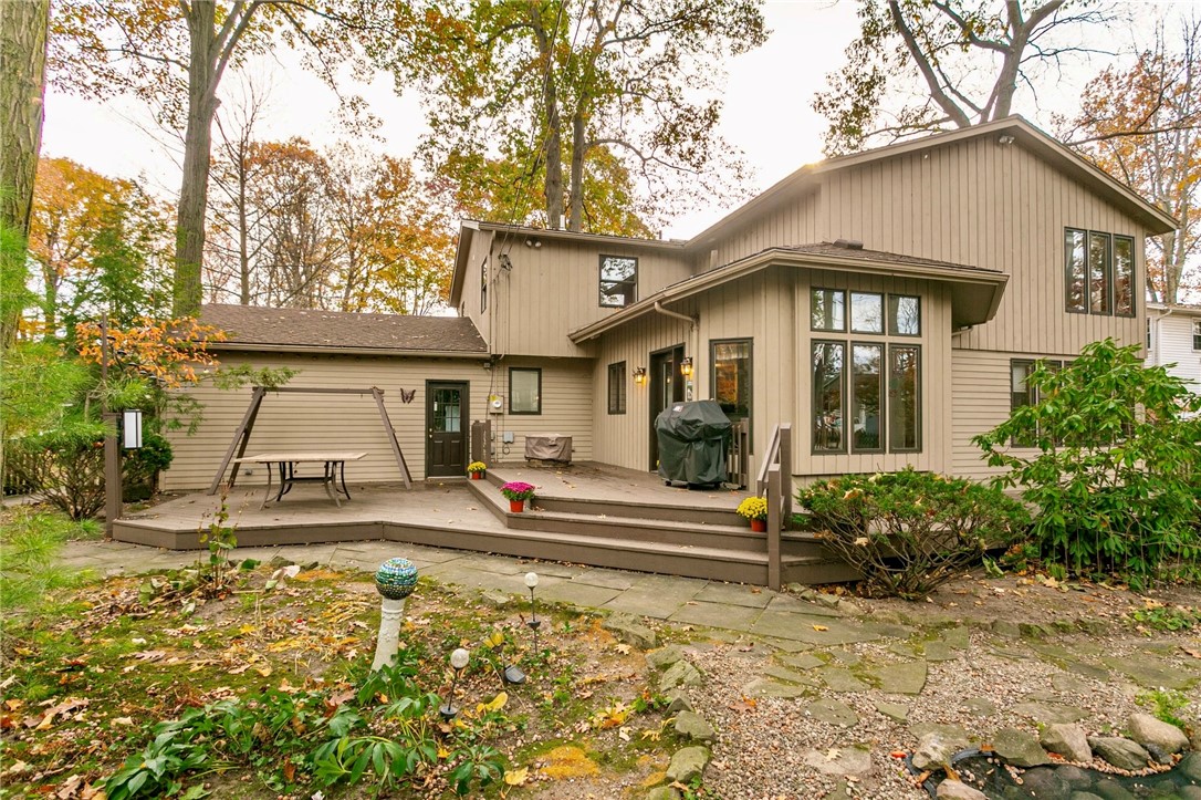 20 Fairfield Drive Perinton, NY 14450 - Photo 4 of 49 Enjoy time on the large deck overlooking parklike