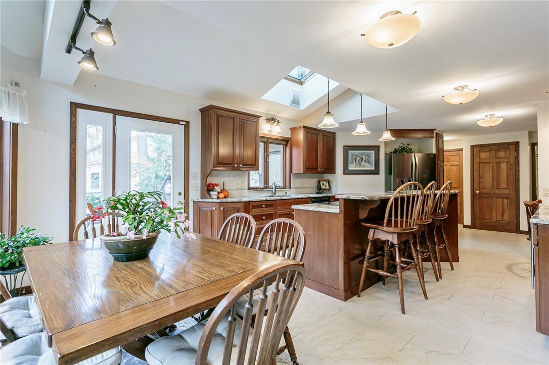 20 Fairfield Drive Perinton, NY 14450 - Photo 10 of 49 Dining Nook overlooking the beautiful back yard an