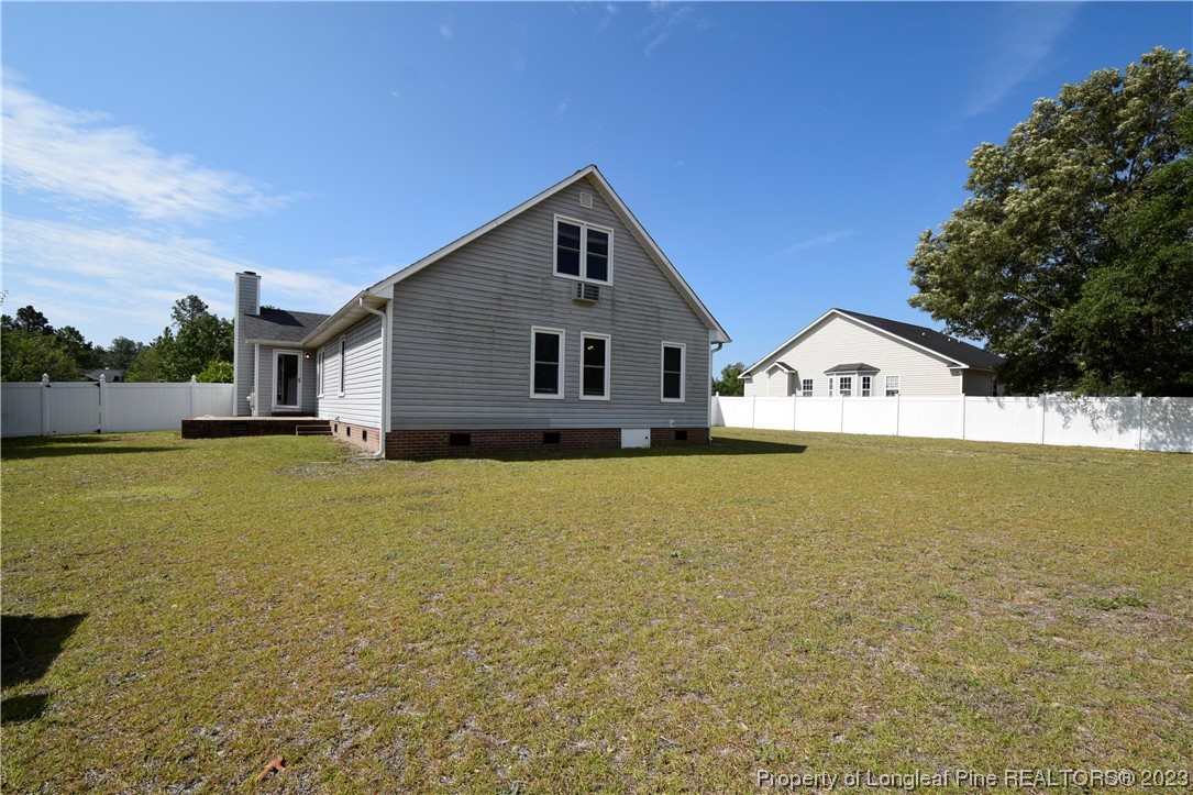 512 Kernstown Road Raeford, NC 28376 - Photo 16 of 25 a view of a house with backyard