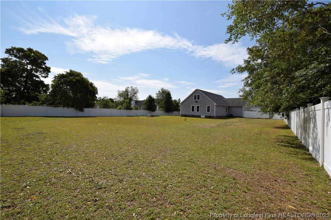 512 Kernstown Road Raeford, NC 28376 - Photo 20 of 25 a view of a lake with a yard