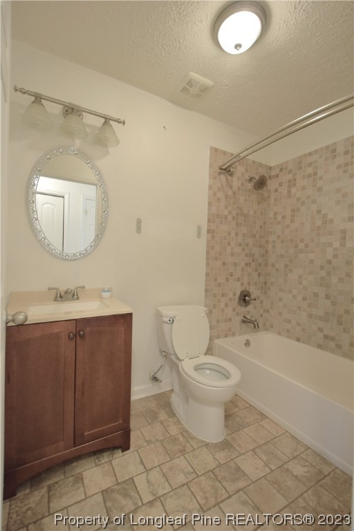 512 Kernstown Road Raeford, NC 28376 - Photo 23 of 25 a bathroom with a toilet a sink and bathtub