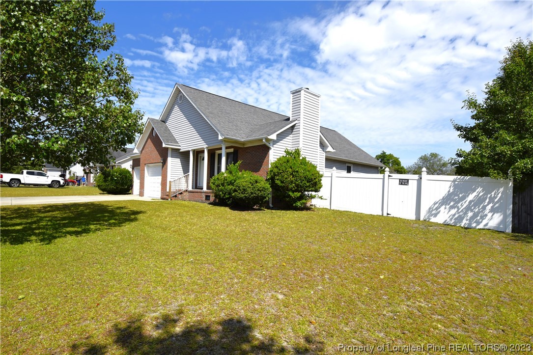 512 Kernstown Road Raeford, NC 28376 - Photo 4 of 25 a house view with swimming pool in front of it