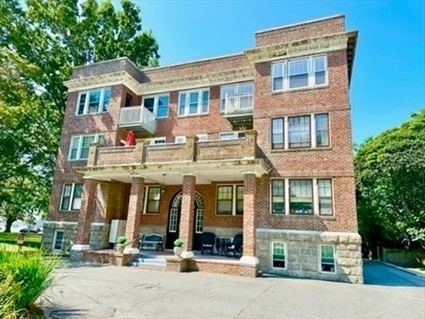 a front view of multi story residential apartment building