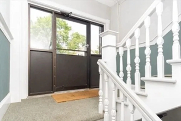 a view of an entryway with staircase