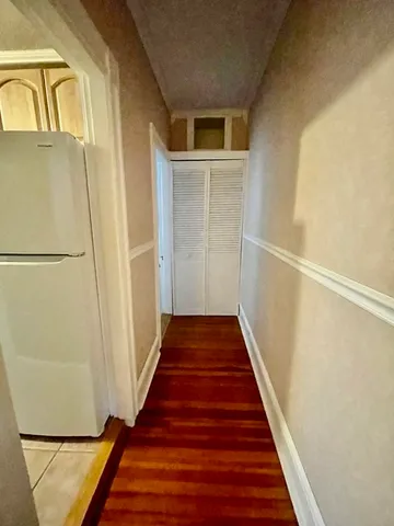 a view of a living room and window